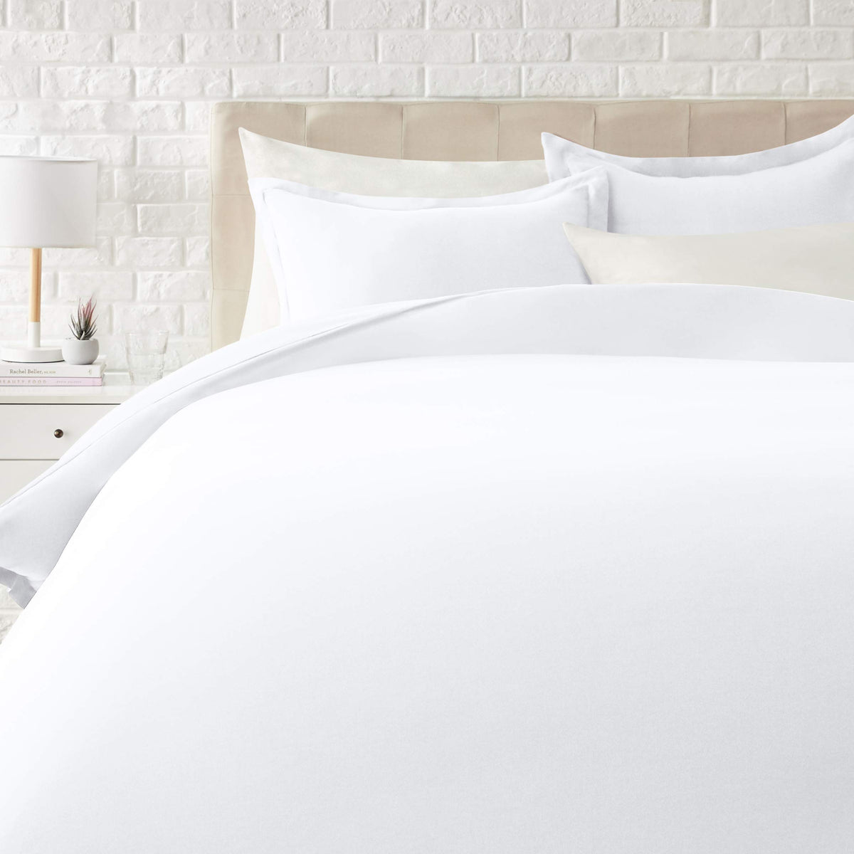 Amazon Basics king duvet cover in bright white, lightweight microfiber for soft, easy care bedding.