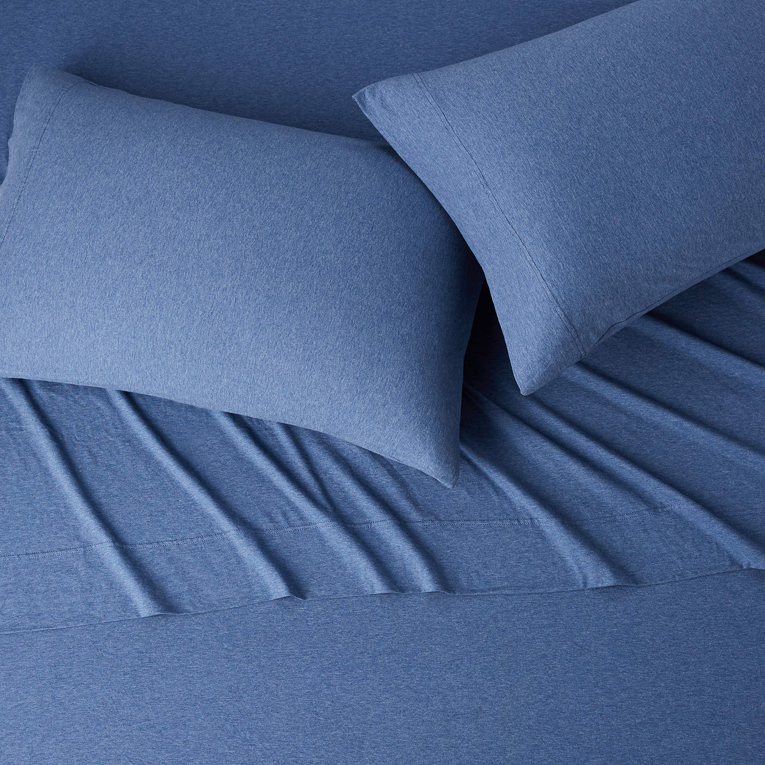 Amazon Basics machine-washable care instructions highlight easy cleaning and lasting softness.