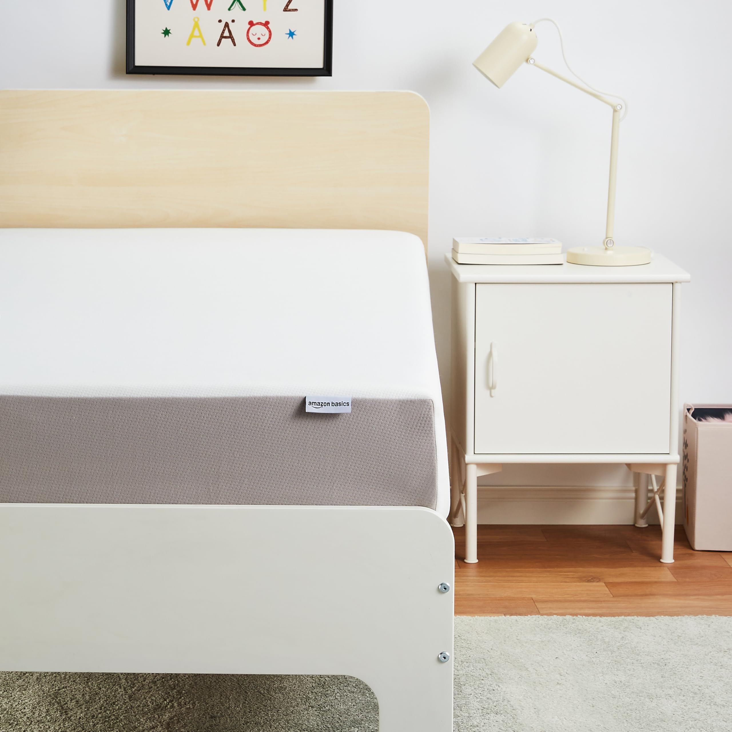 Amazon Basics memory foam mattress twin with a soft plush feel for comfort.