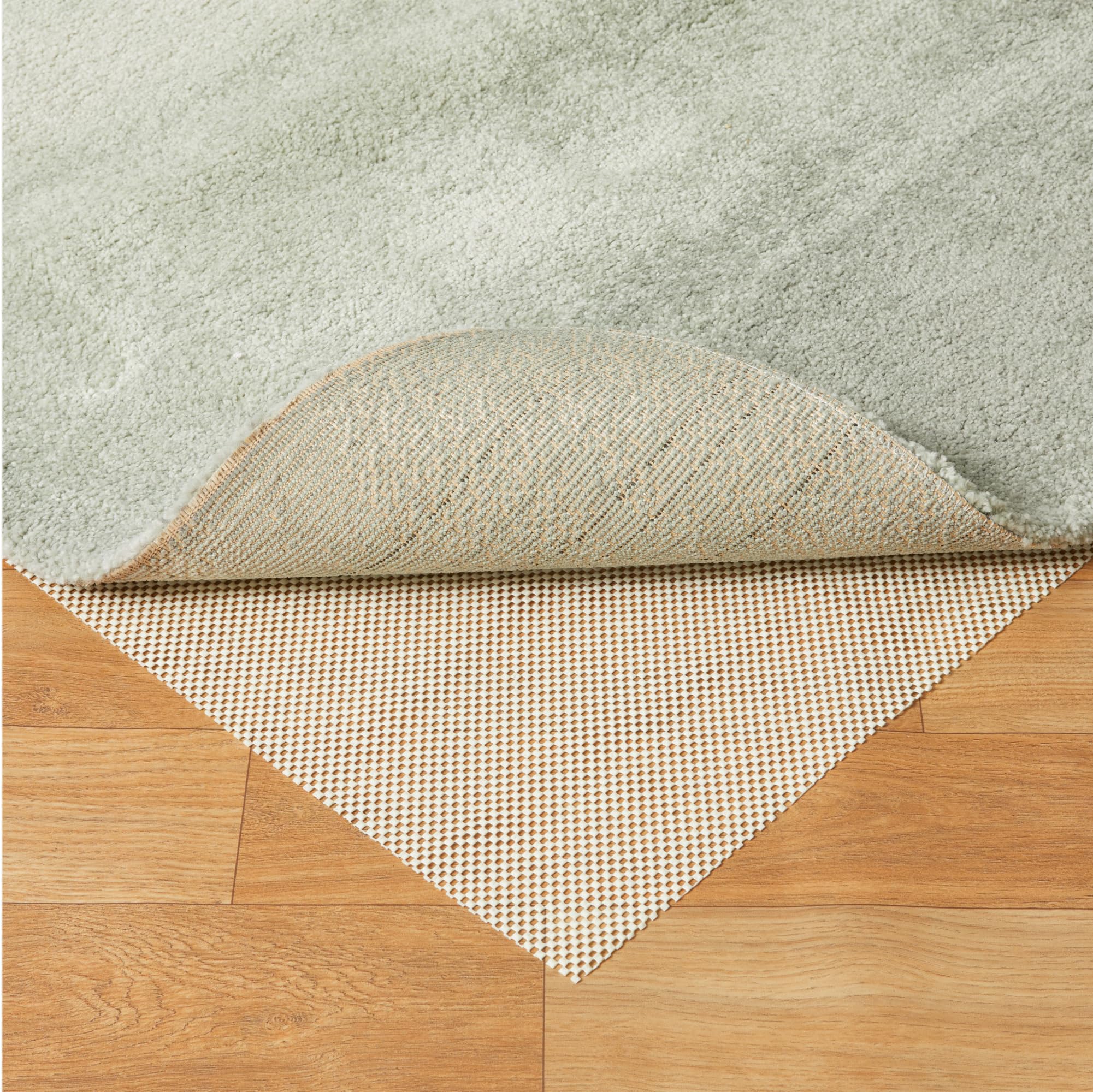 Amazon Basics rug pad 8x10 cut-to-fit, easy trimming for custom spaces.