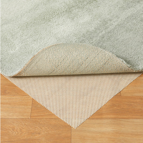 Amazon Basics rug pad 8x10 cut-to-fit, easy trimming for custom spaces.
