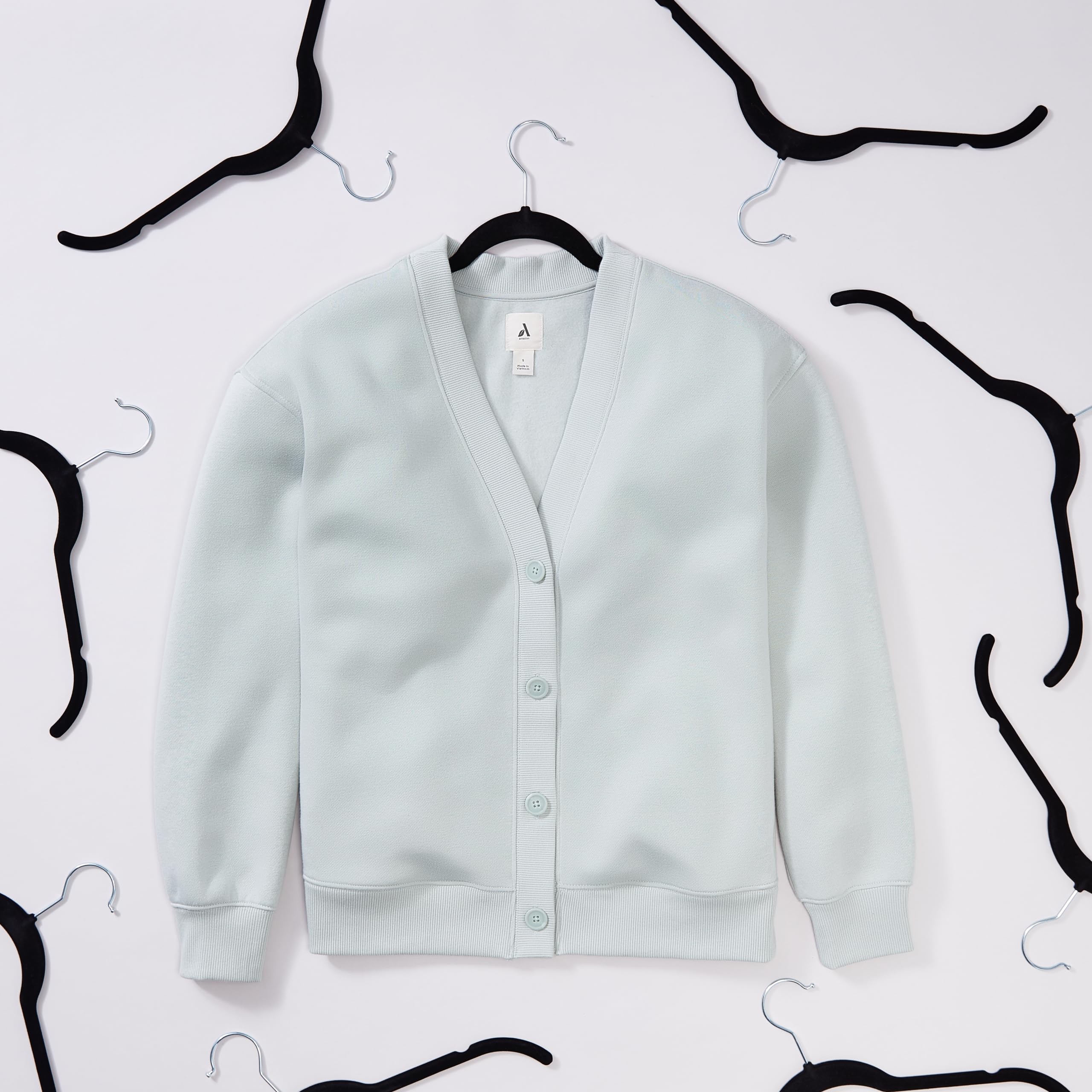 Notched shoulder detail on Amazon Basics hangers secures garments