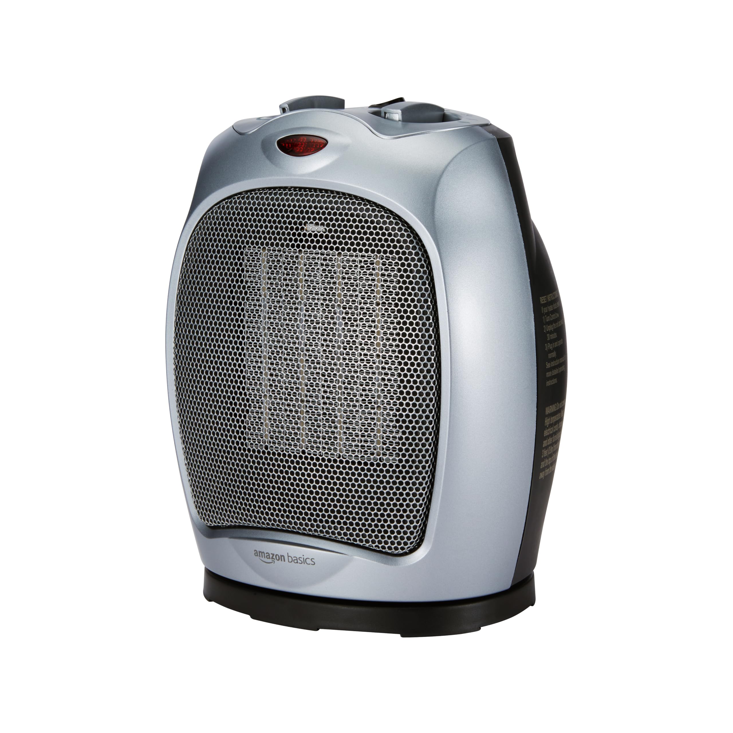 Amazon Basics oscillating ceramic heater delivering even warmth across the room.