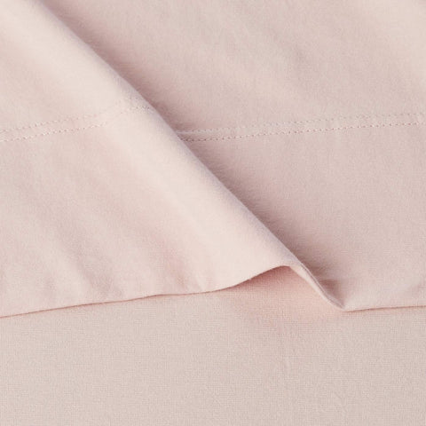 Amazon Basics pillowcase in blush completes the set with soft, durable cotton jersey.