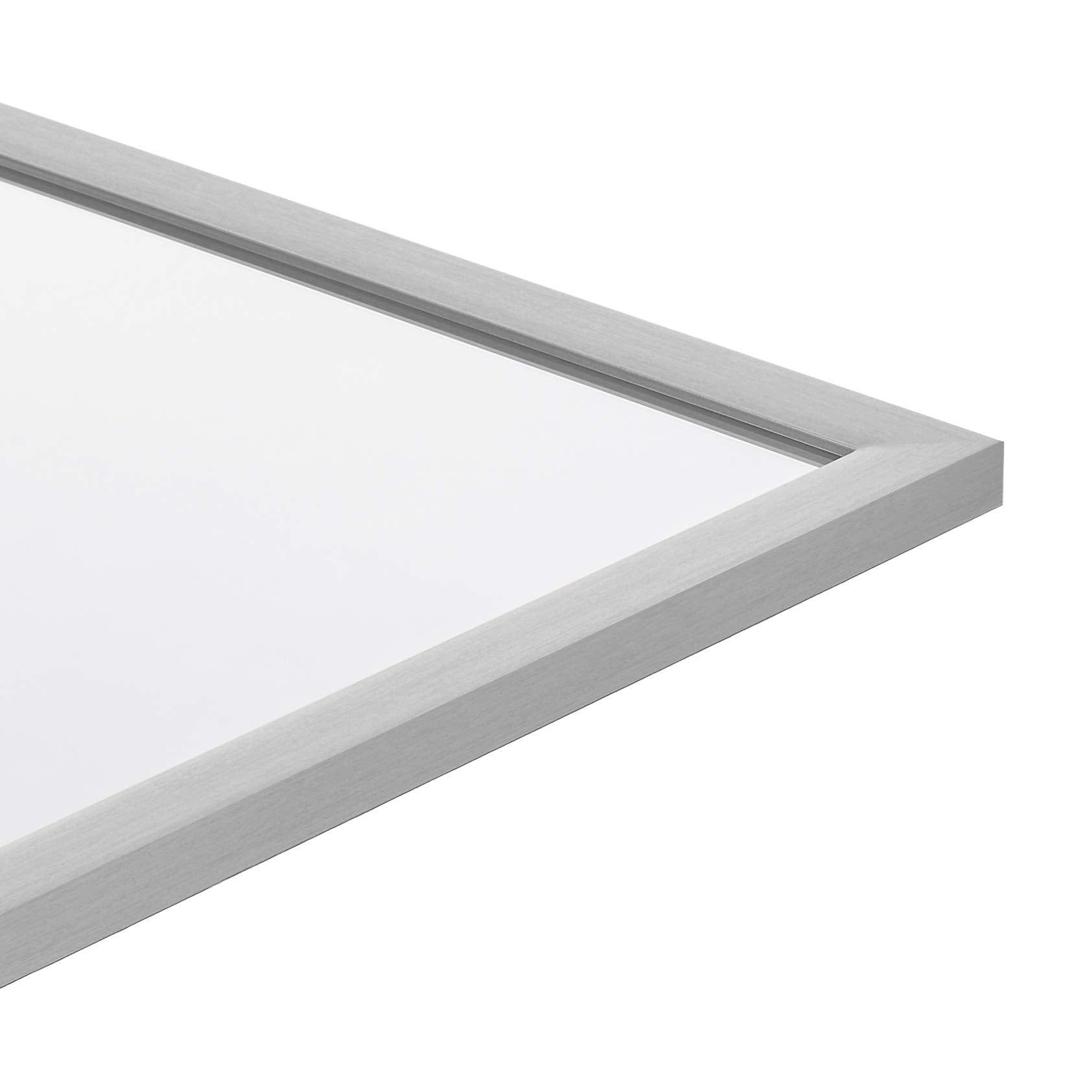 Amazon Basics rectangular wall mirror 24x36 hanging horizontally ideal for living rooms.
