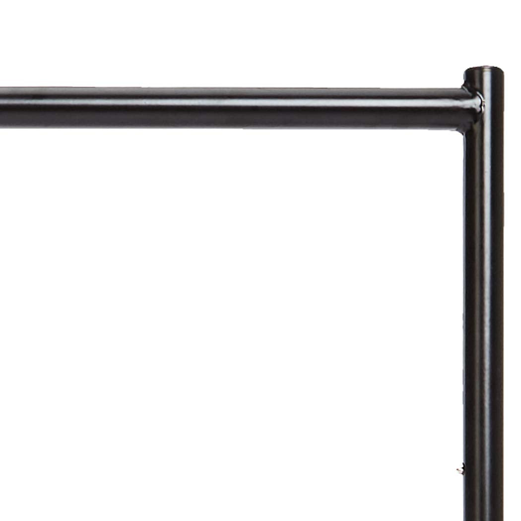Rolling garment rack used in a retail display setting by Amazon Basics.