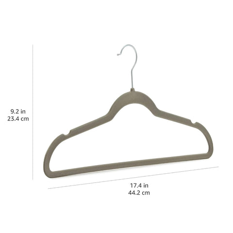 Hangers holding shirts and jackets using Amazon Basics set.