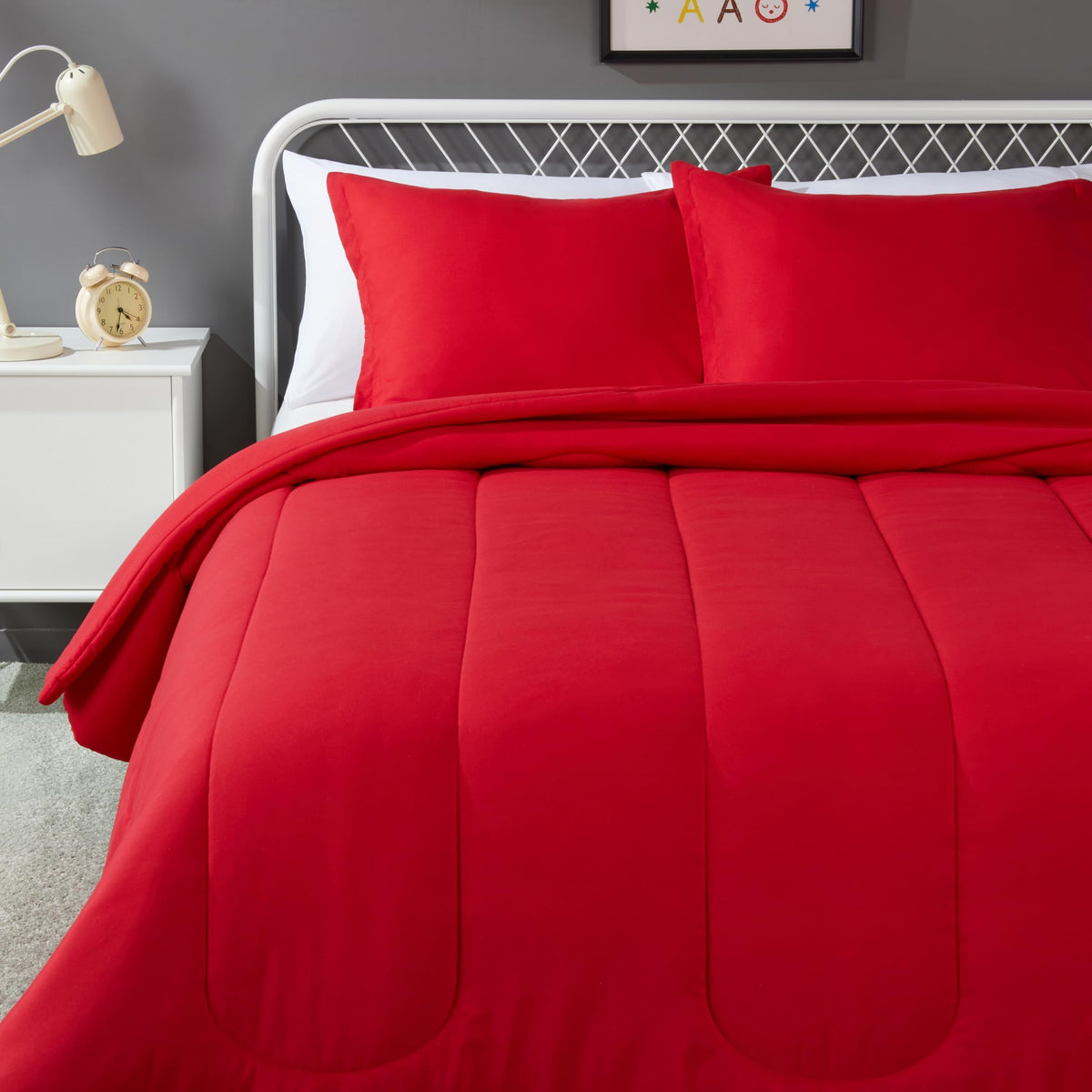 Amazon Basics soft microfiber kid comforter and sham in red for cozy all-season warmth.