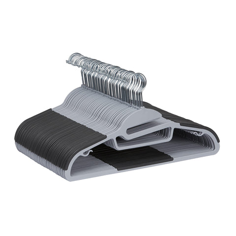 Amazon Basics space-saving hangers with 360-degree swivel keep shirts and jackets neatly arranged.