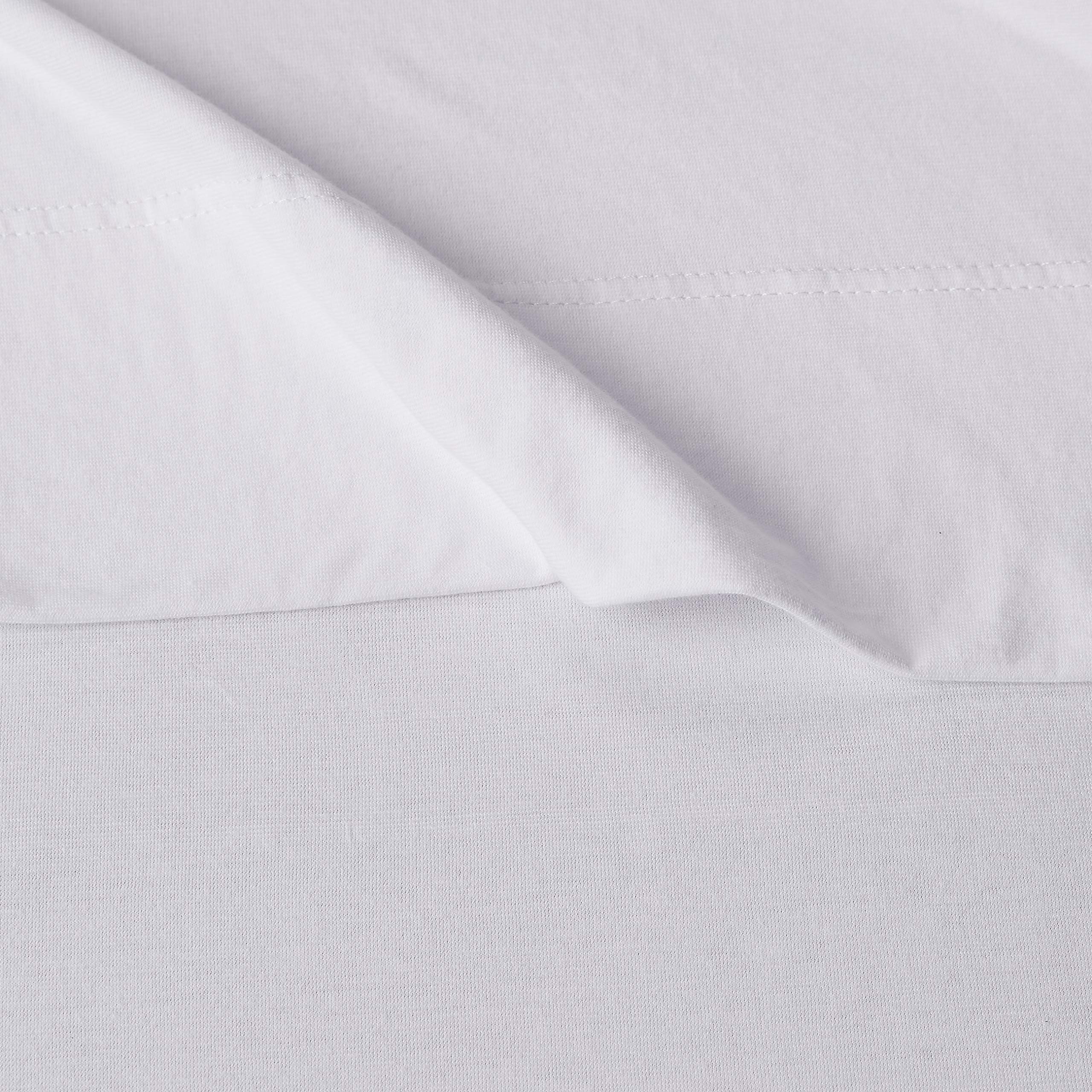 Amazon Basics breathable fabric highlights secure stretch and quick sheet changes.