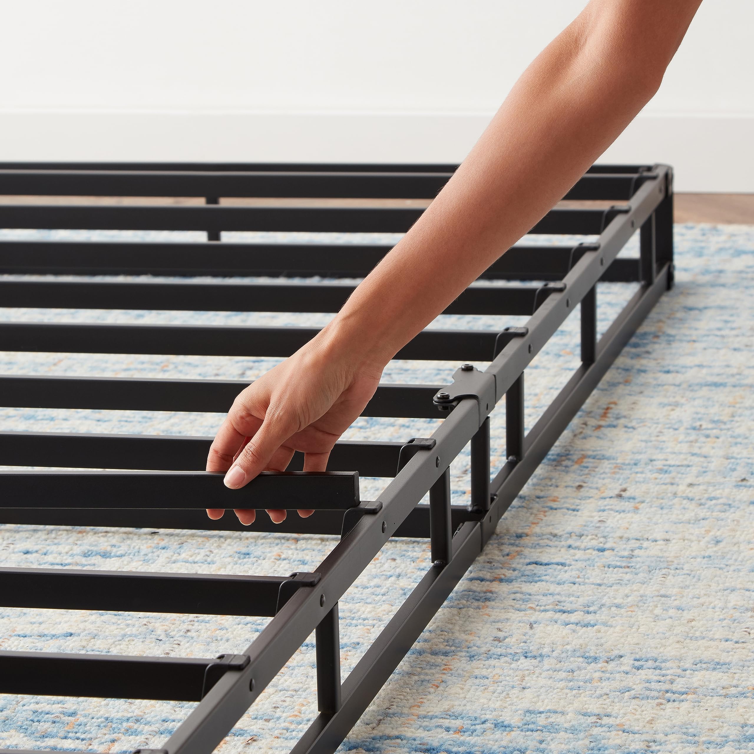Amazon Basics Sturdy Box Spring Base supports all mattress types for versatile use.