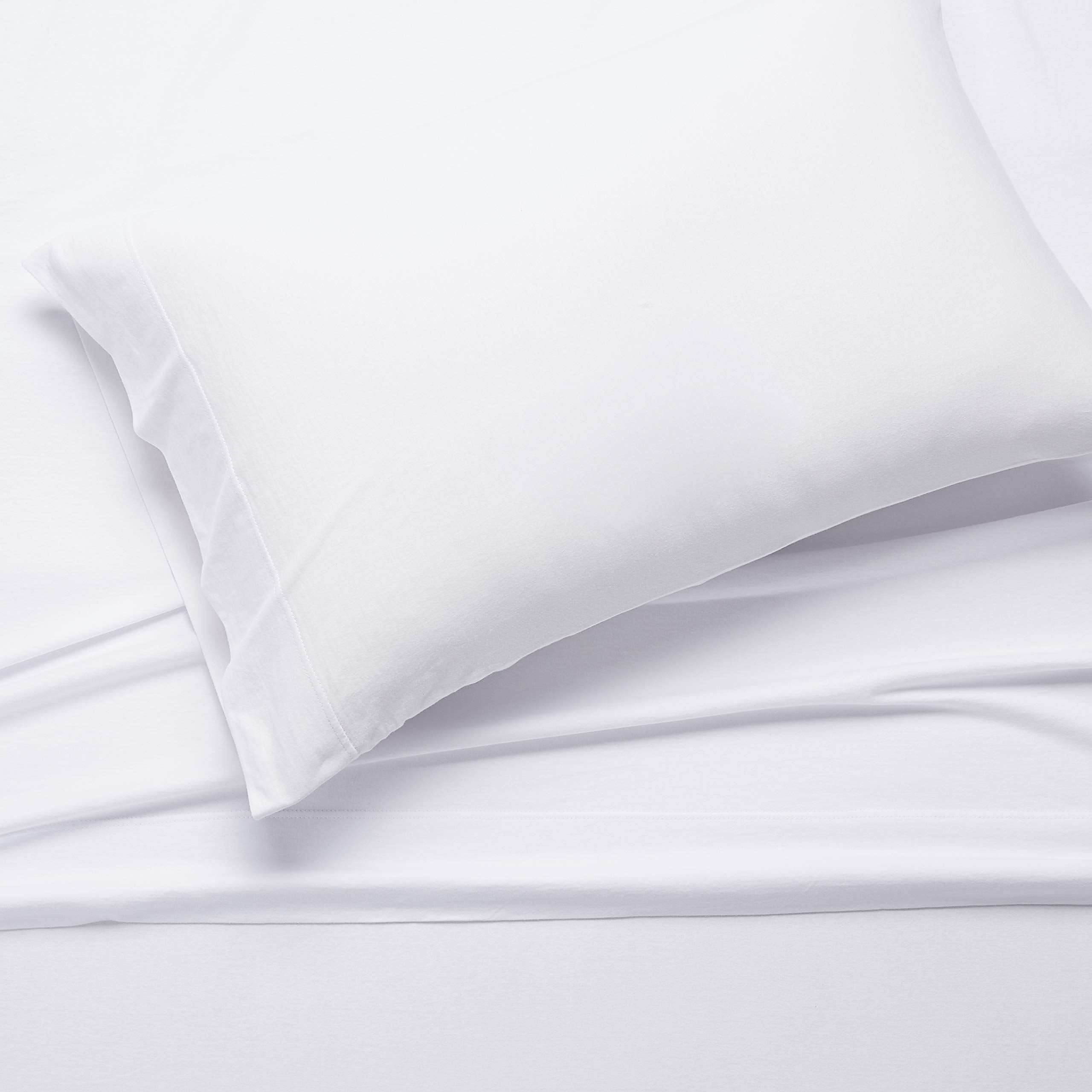 Amazon Basics twin fitted sheet secured on mattress up to 14 inches deep