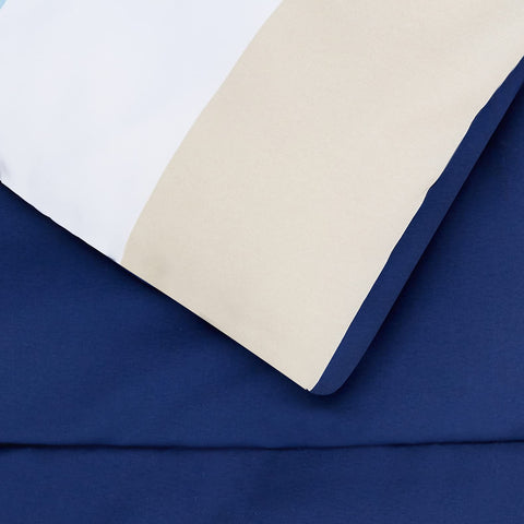 Amazon Basics 20x26 sham with blue stripe complements the bedding.