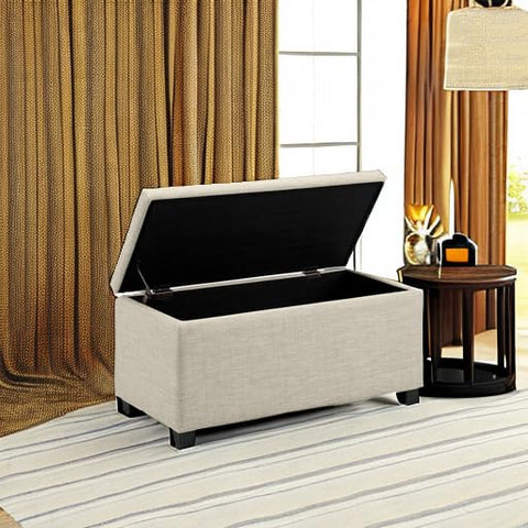 Beige Amazon Basics ottoman in bedroom or living room, stylish seating with storage.