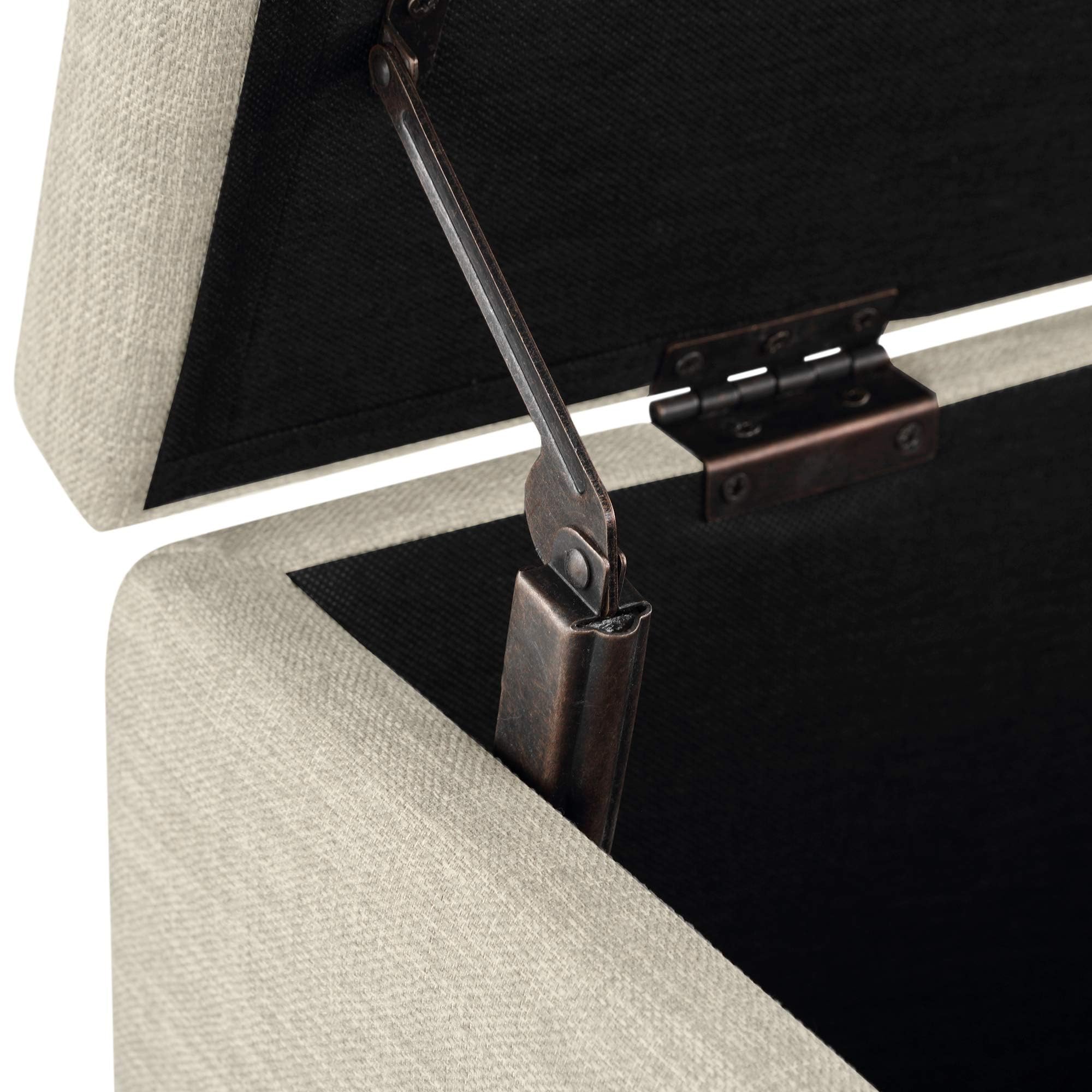 Amazon Basics beige ottoman shows sturdy hardwood frame for everyday use.