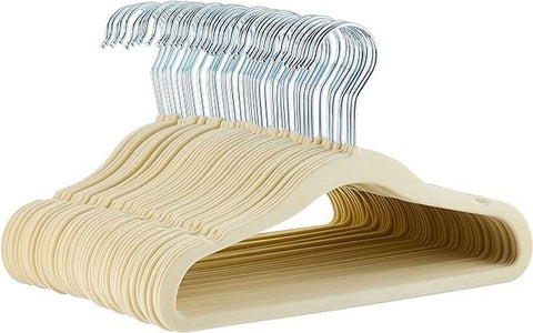 Amazon Basics velvet non-slip baby hangers keep outfits neatly in place.