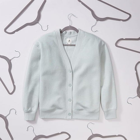 Amazon Basics velvet non-slip hangers prevent shifting and protect garment shoulders.