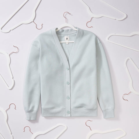 Durable metal-core design supports up to 10 pounds for heavier garments on Amazon Basics hangers.