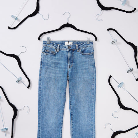 Amazon Basics velvet skirt hanger highlighting durable, rust-resistant construction