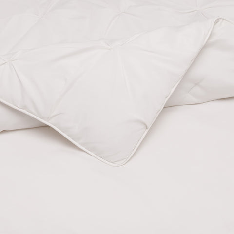 Bed setup with Amazon Basics full/queen comforter set for versatile styling.