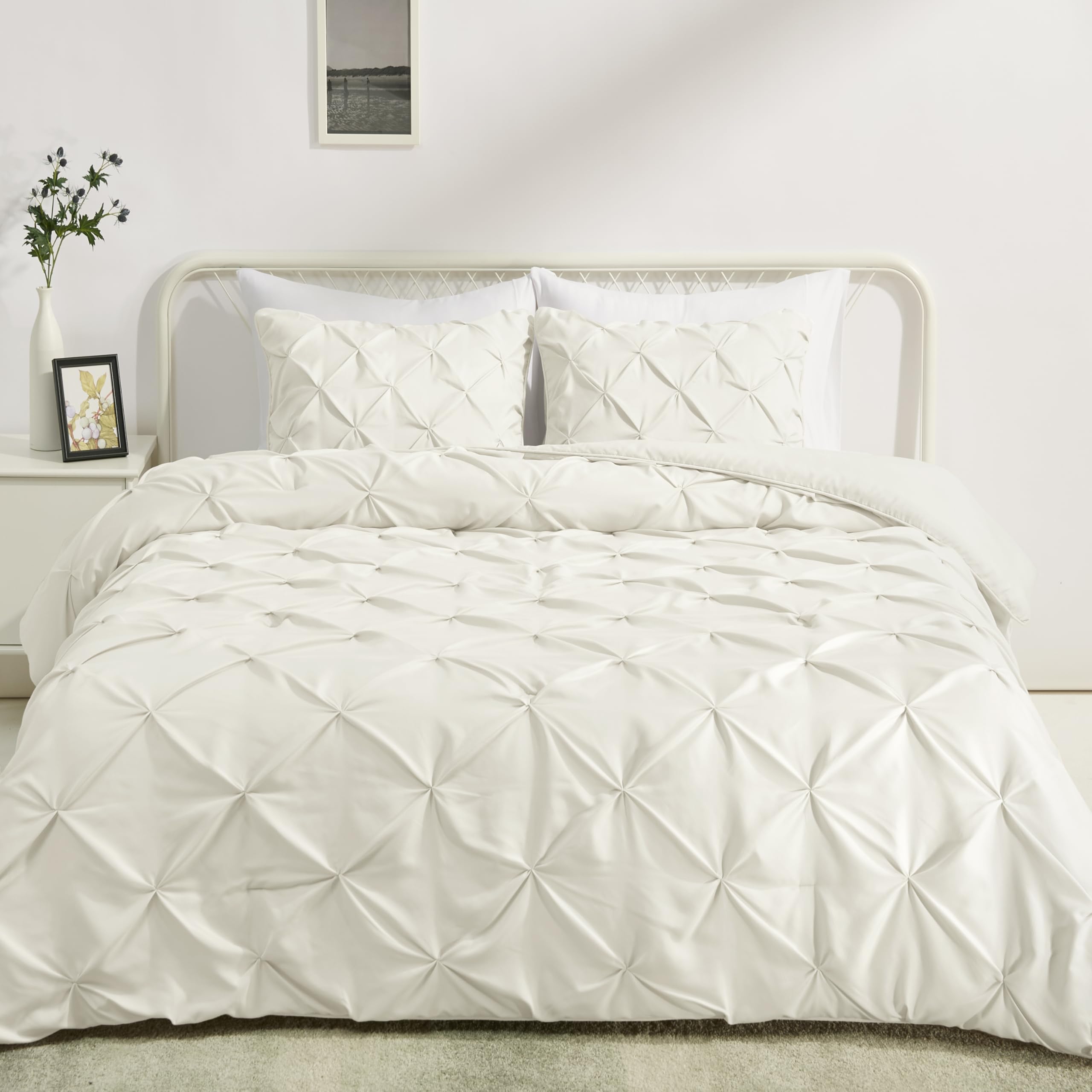 Amazon Basics warm down-alternative comforter on a full bed for cozy sleep.