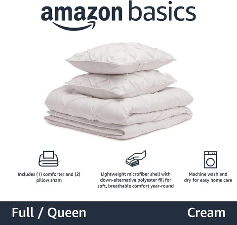 Close-up of pinch-pleat detail on Amazon Basics comforter highlighting elegant design.