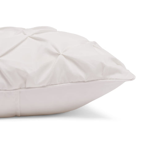 Piped edge closeup showing refined stitching on Amazon Basics comforter.