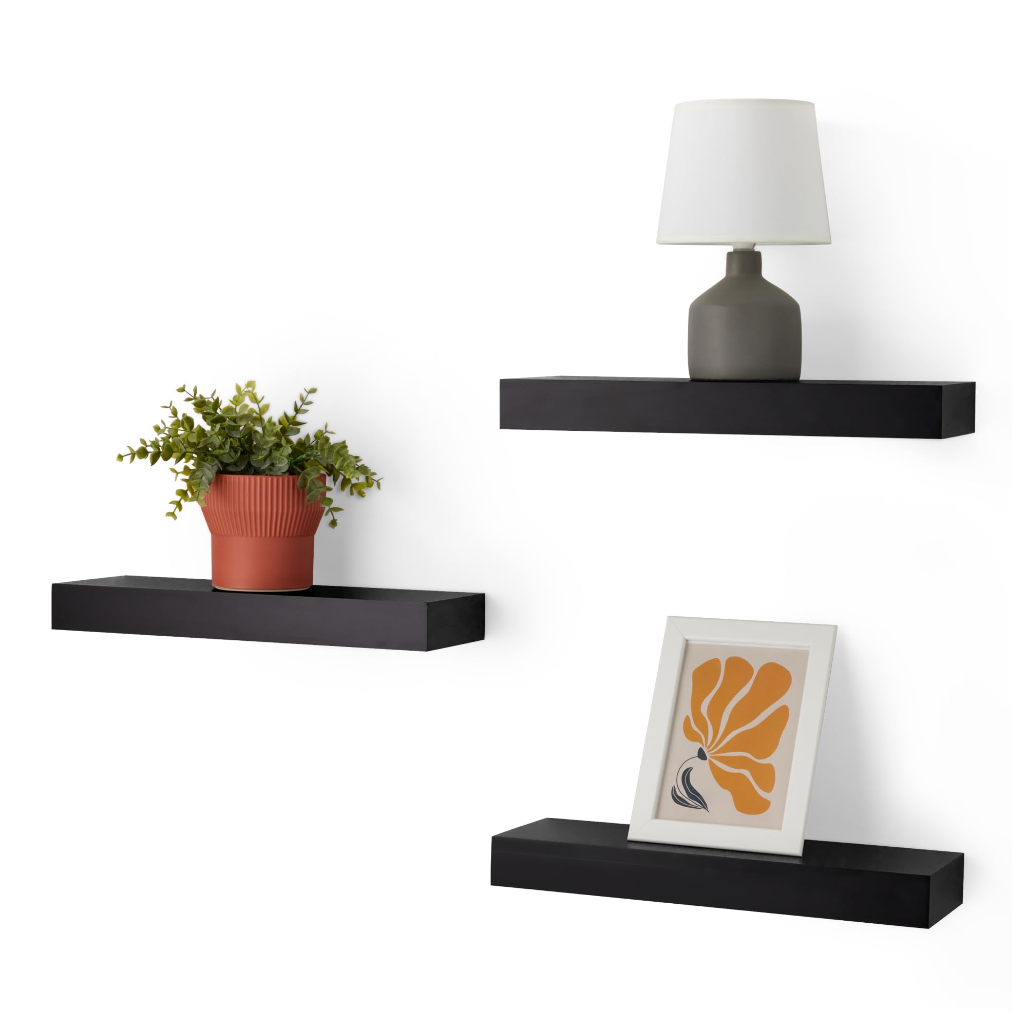 Amazon Basics wood floating shelf 3-pack in black offers extra storage and display.