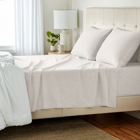Amazon Basics cotton jersey flat sheet for queen size offers breathable comfort and secure fit.