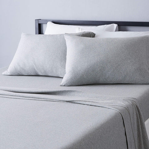 Amazon Basics cotton jersey king sheet close-up shows soft, breathable fabric.