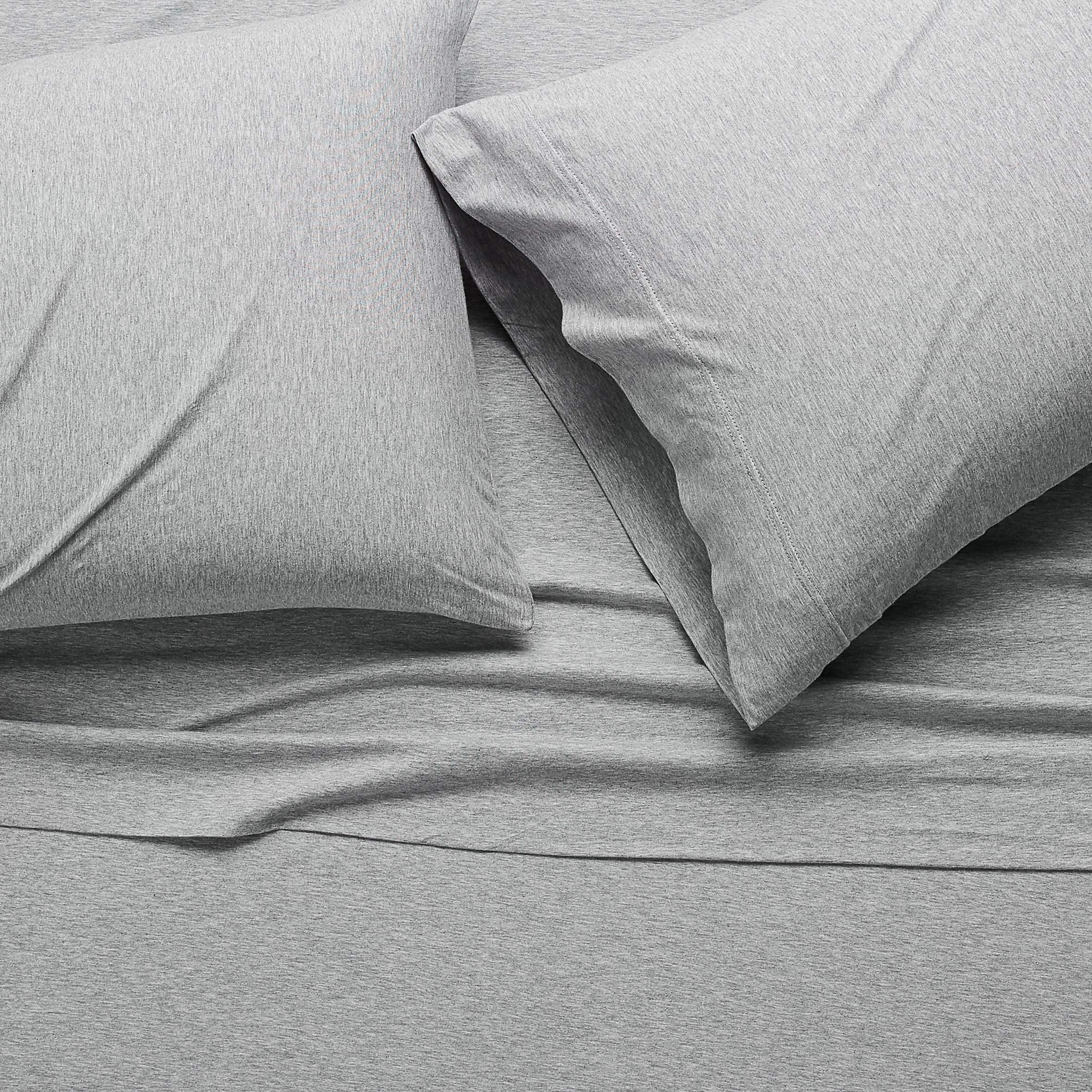 Amazon Basics flat sheet with easy care label and smooth finish.