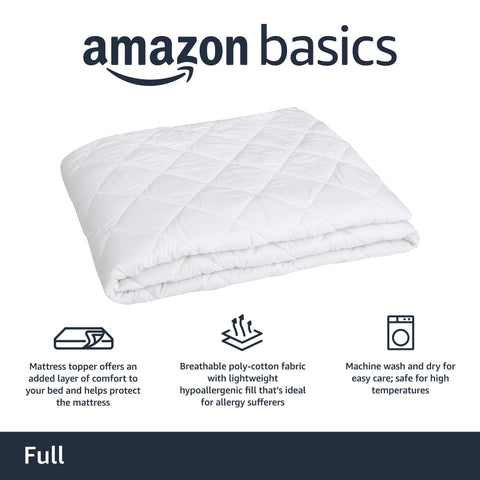 Amazon Basics full-size quilted topper shows snug mattress fit.