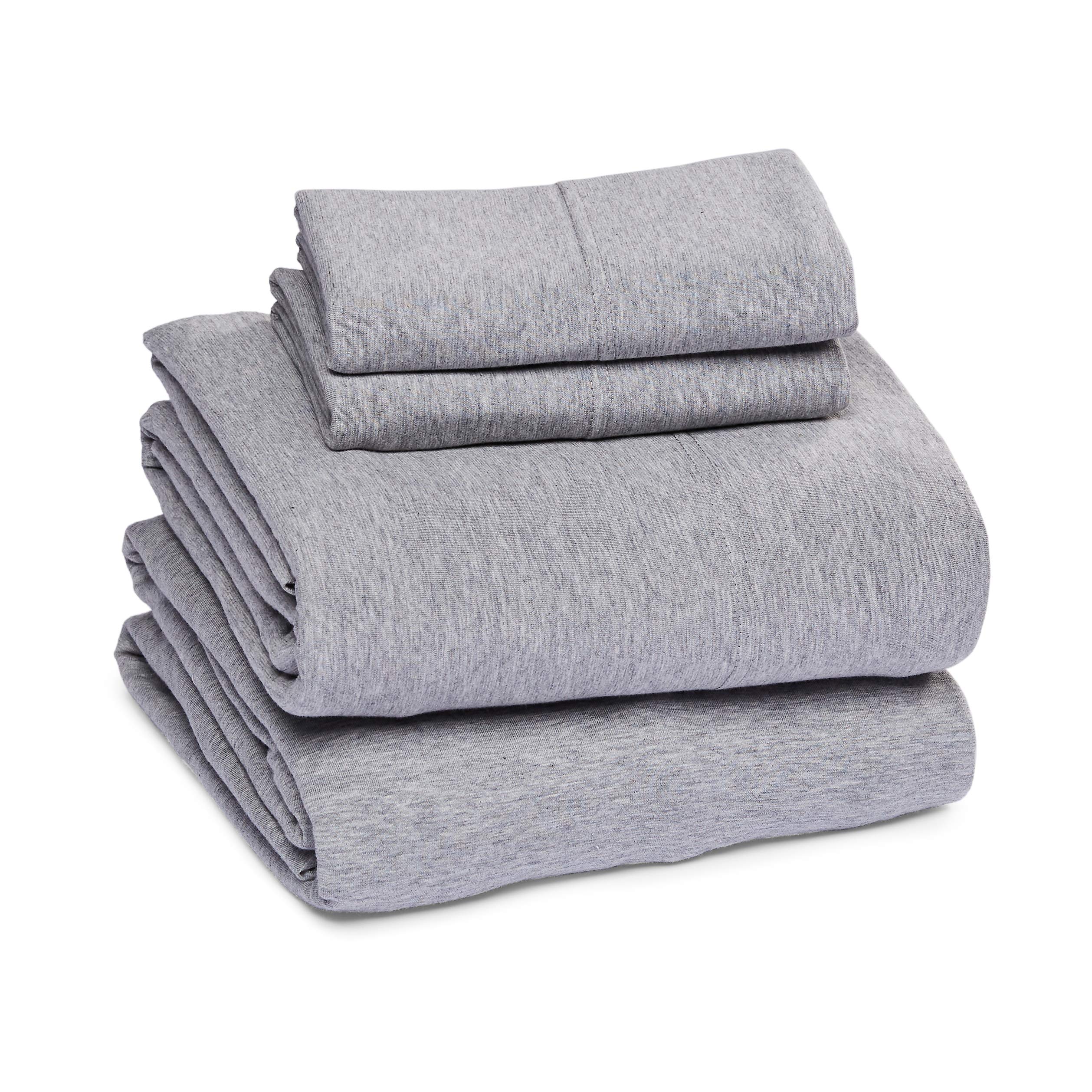 Amazon Basics jersey king fitted sheet detail demonstrates secure stretch for deep mattresses.
