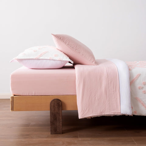 Amazon Basics Kids' Pink Bedding Set pillow sham with secure stitching for durability.