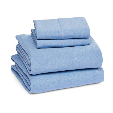 Amazon Basics king cotton jersey flat sheet laid flat for easy bed layering.