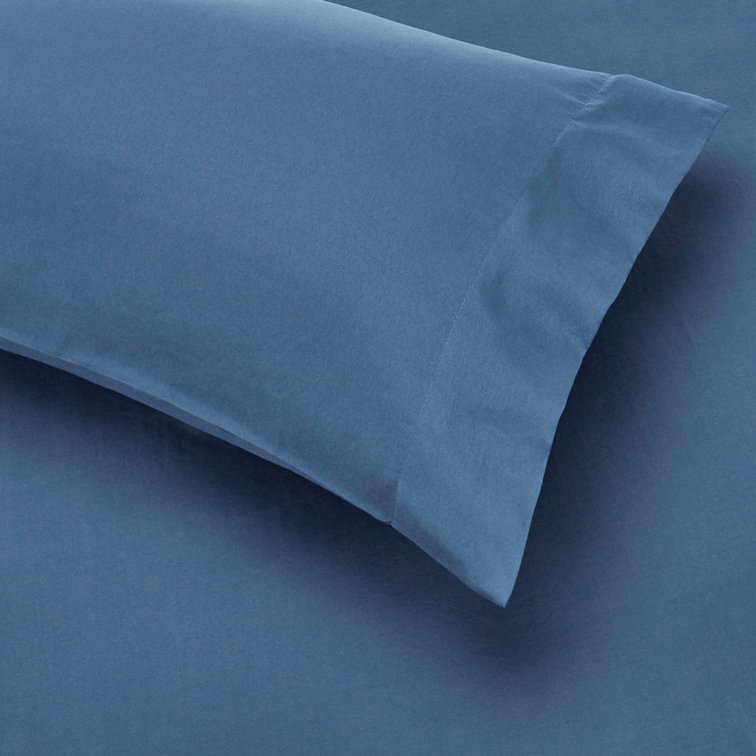 Amazon Basics blue Calvin-striped pillowcase keeps pillows fresh and protected