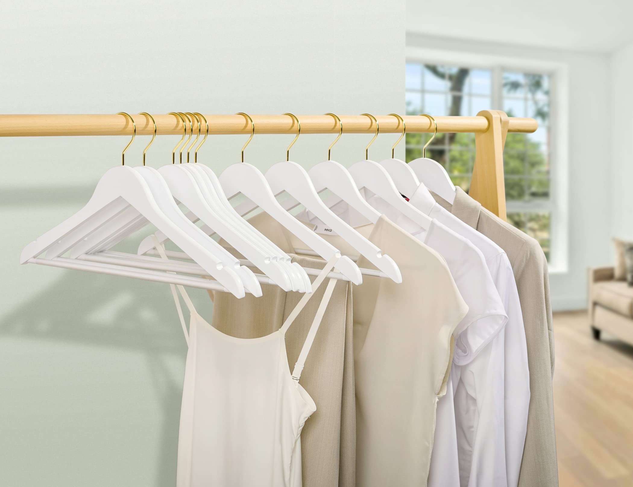 Amber Home ergonomic hanger supports dresses and tanks without creases.