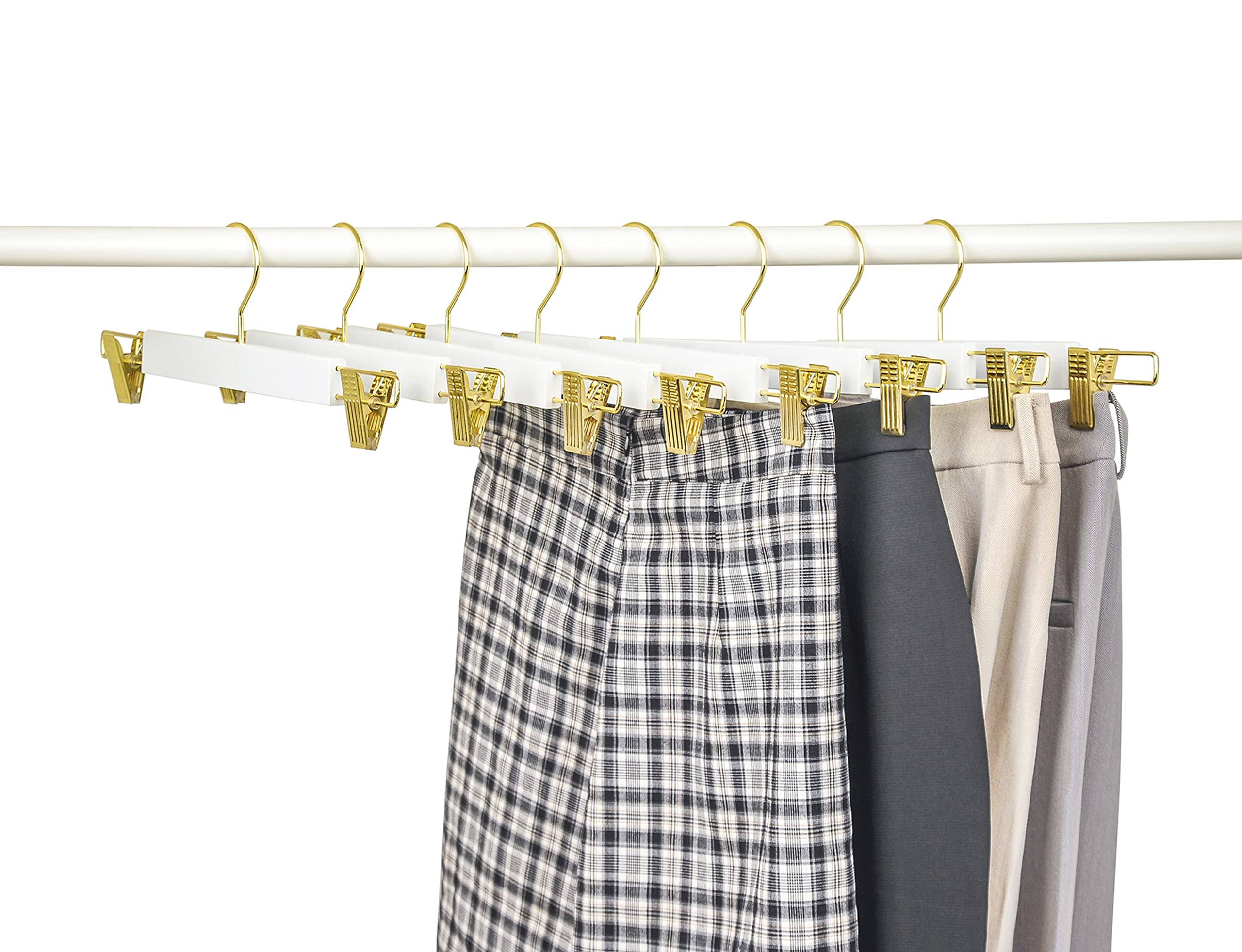 Amber Home gold-accent hangers suit modern bedroom décor.