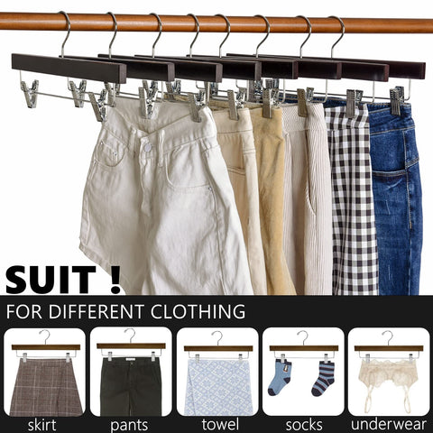 Amber Home swivel-hook wooden hanger demonstrates versatile closet organization.