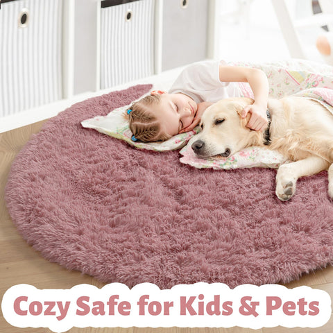 Amdrebio blush fluffy round rug in kids room decor highlighting vibrant color and cozy play area