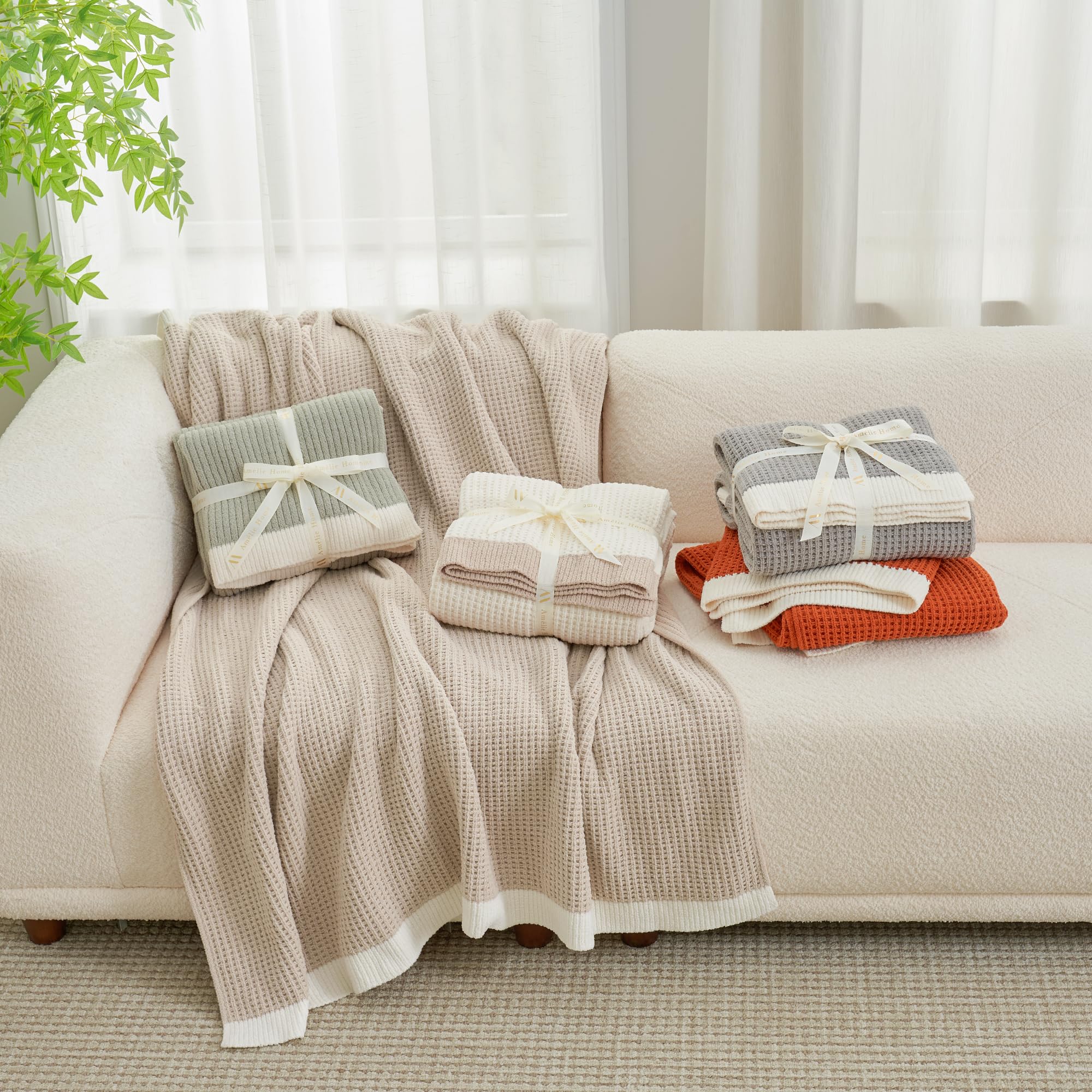 Amélie Home chenille throw perfect for naps and cozy evenings.