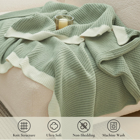 Amélie Home chenille waffle throw elegantly drapes on a couch to elevate style.