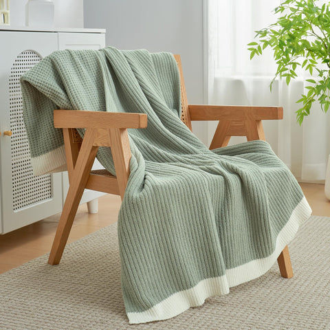 Amélie Home chenille waffle throw presented as a cozy gift option.