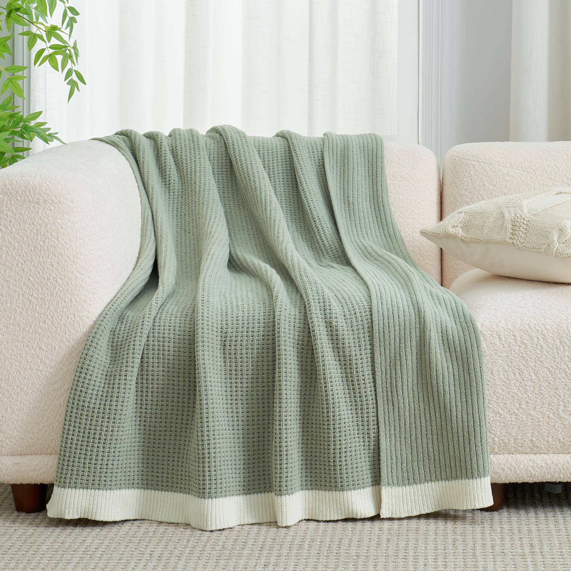 Amélie Home chenille waffle throw ready for machine washing on gentle cycle.