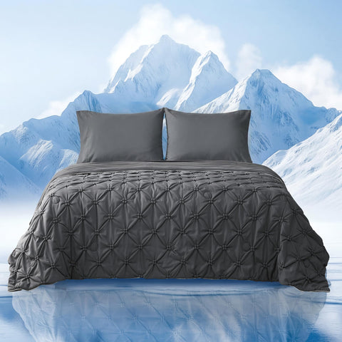 Amélie Home elegant pintuck cooling comforter with silky touch for chic, cool nights.