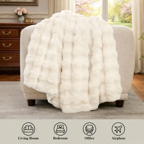 Amélie Home cream bubble-pattern throw drapes beautifully on sofas