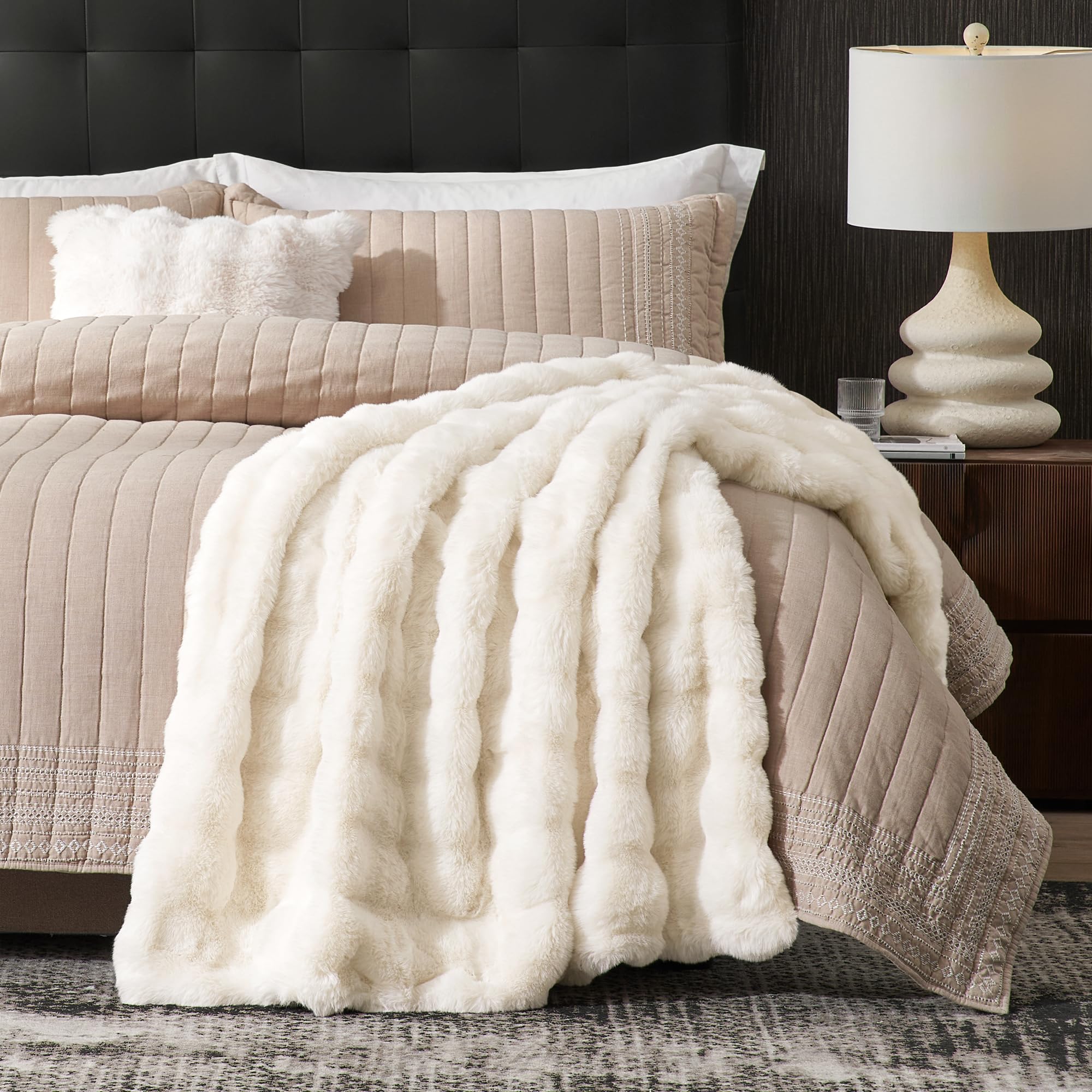 Amélie Home throw draped over a sofa highlighting drape and style