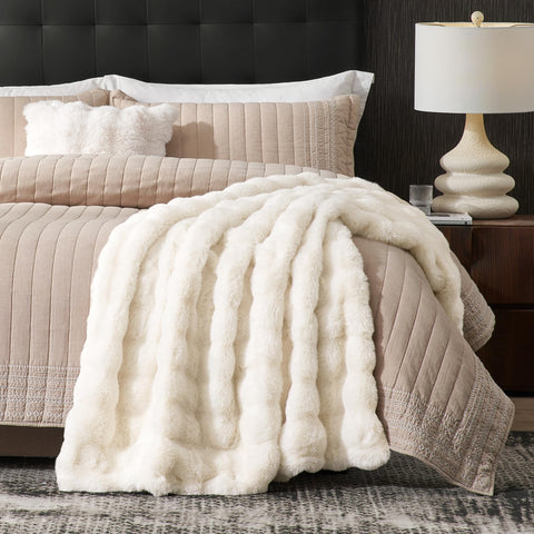 Amélie Home throw draped over a sofa highlighting drape and style