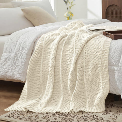 Amélie Home knit throw blanket bed-layering adds texture and warmth to morning rituals.