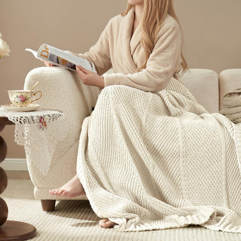 Amélie Home knit throw blanket lightweight-warmth delivers warmth without bulk for everyday use.